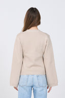 Beige knit cardigan with V-neck and buttons – women’s minimalist sweater.